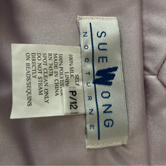 Beautiful dress. Worn only once. Was purchased at Bloomingdale's. - Picture 8 of 9